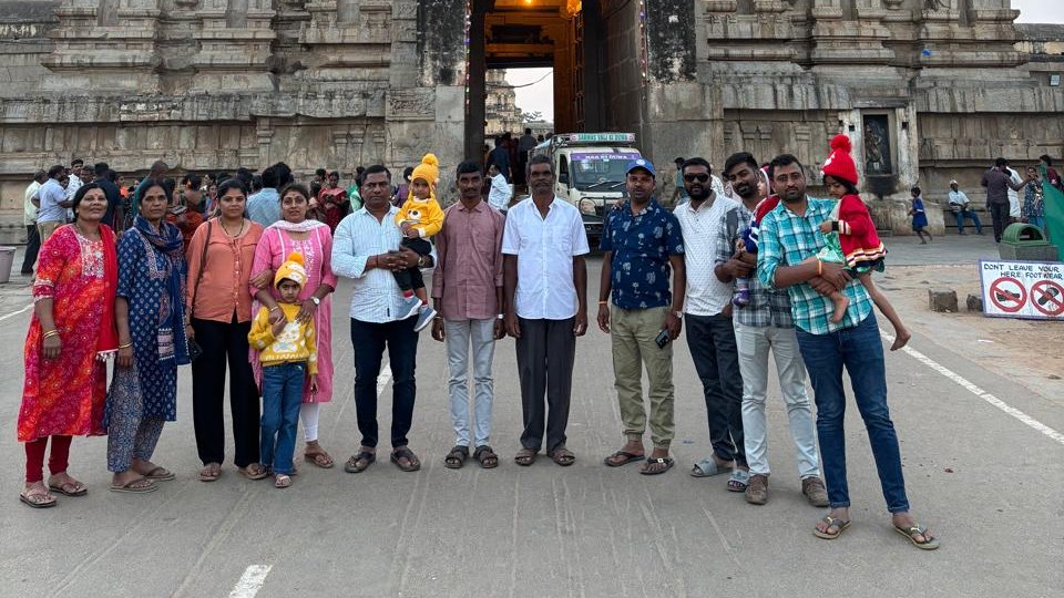 Family group visiting a temple near Chikmagalur with True Choice Travels